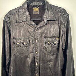 Civilianaire black sheepskin leather western-style shirt with snap buttons.